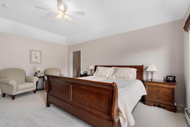 bedroom featuring a baseboard radiator, a ceiling fan, and light colored carpet