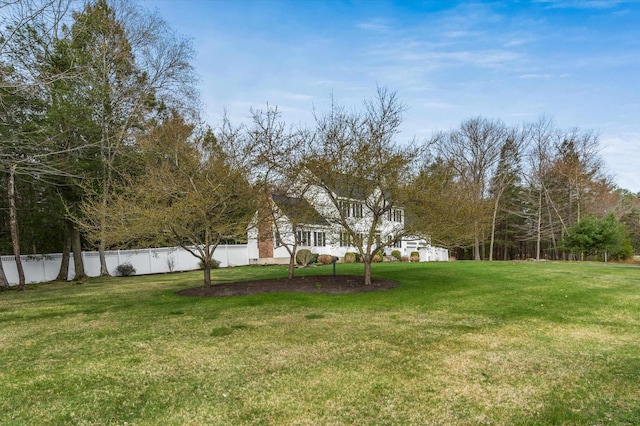 view of yard featuring fence
