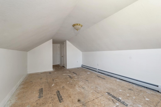 bonus room with baseboards, a baseboard heating unit, and lofted ceiling