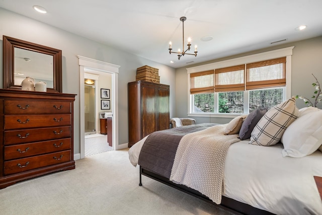 bedroom featuring light carpet, baseboards, ensuite bathroom, recessed lighting, and a chandelier