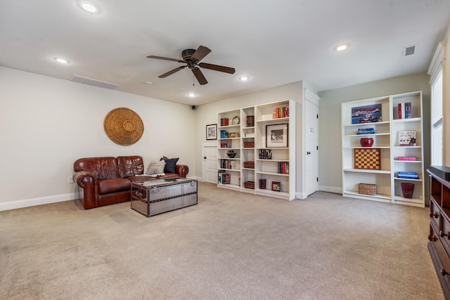 carpeted living area with a ceiling fan, baseboards, visible vents, and recessed lighting