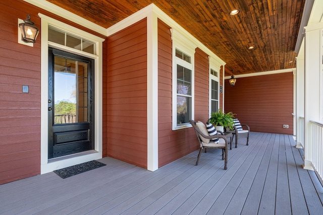 property entrance with covered porch