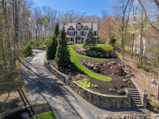 surrounding community featuring driveway