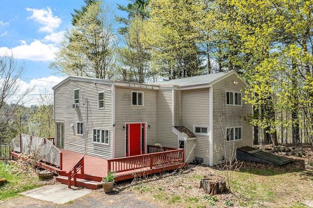 view of front of home with a wooden deck