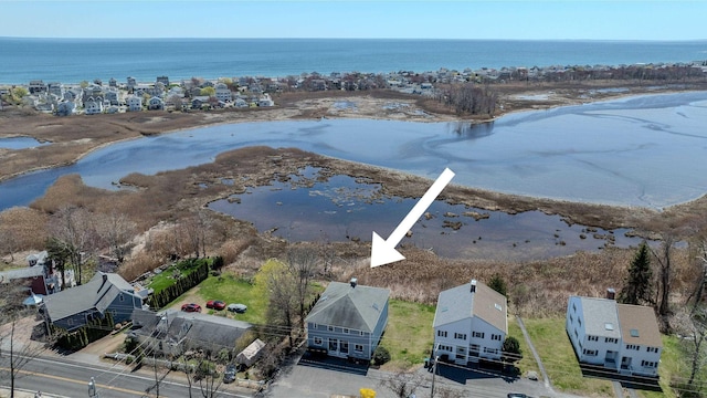 drone / aerial view with a water view