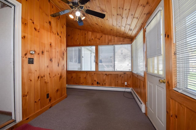 unfurnished sunroom with a baseboard heating unit and baseboard heating