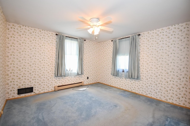 empty room with ceiling fan, carpet, baseboards, wallpapered walls, and a baseboard radiator