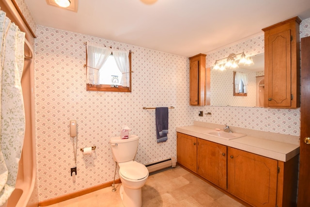 full bath featuring vanity, tile patterned floors, baseboard heating, and toilet