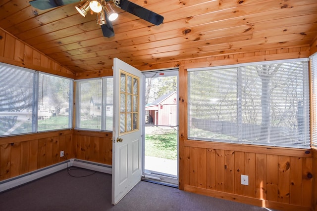 unfurnished sunroom with baseboard heating