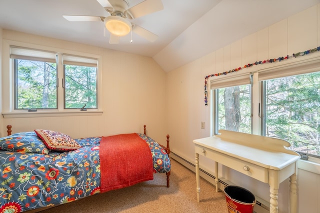 bedroom with carpet floors, ceiling fan, a baseboard heating unit, and vaulted ceiling