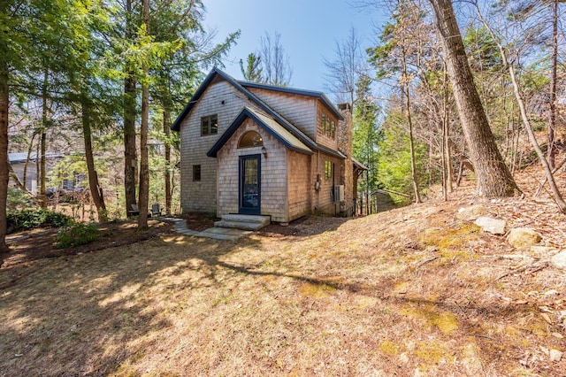 view of front of home with a chimney