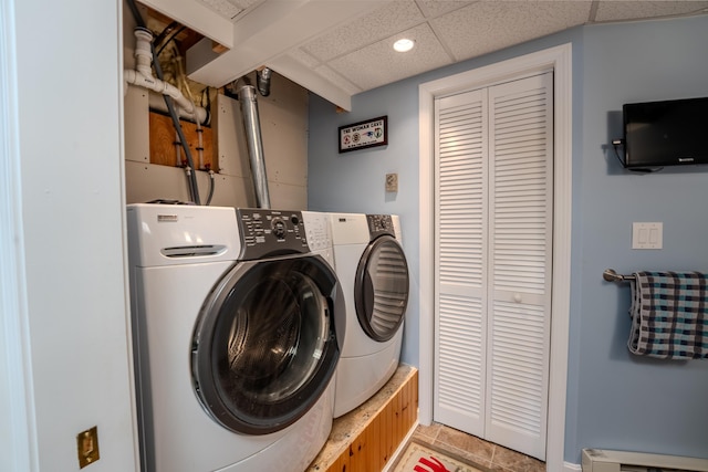 laundry room featuring separate washer and dryer, recessed lighting, baseboards, and a baseboard heating unit