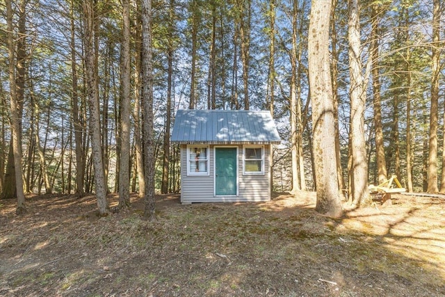view of outbuilding with an outdoor structure