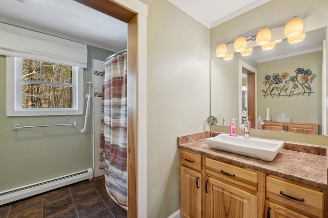 bathroom with crown molding, curtained shower, a baseboard heating unit, and vanity