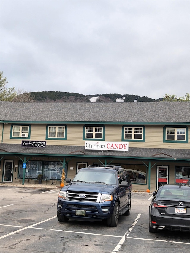 264 Main St Unit Q 31, Lincoln, NH 03251 - view of front of house featuring uncovered parking
