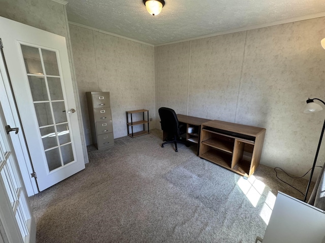 office with carpet floors, a textured ceiling, crown molding, and french doors