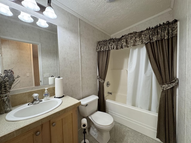 bathroom with vanity, ornamental molding, shower / bath combination with curtain, toilet, and a textured ceiling