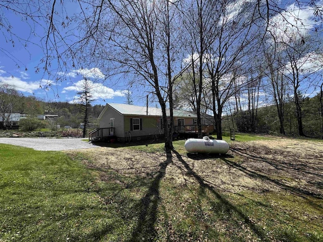 view of yard with a deck