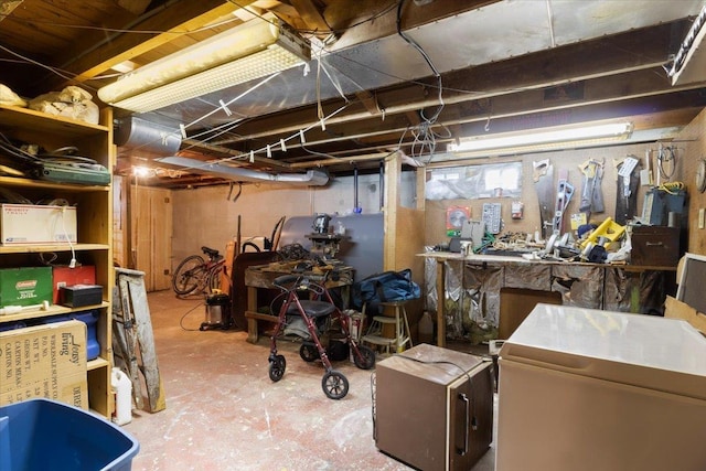 basement featuring refrigerator