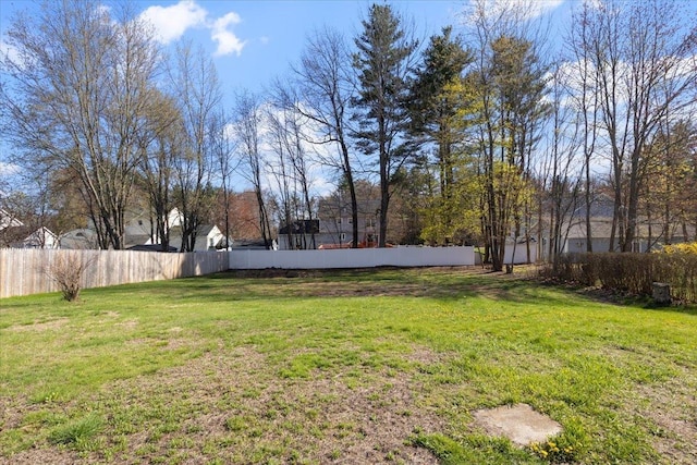 view of yard with fence