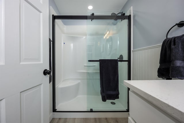full bathroom featuring a stall shower