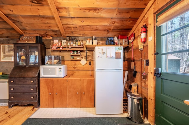 kitchen with white appliances, wood ceiling, open shelves, and wood finished floors