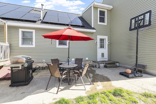 view of patio featuring area for grilling and outdoor dining space