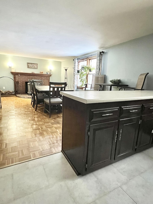 12 Nathaniel Dr, Amherst, NH 03031 - kitchen featuring dark cabinetry and light countertops