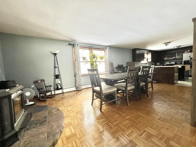 12 Nathaniel Dr, Amherst, NH 03031 - dining room with a wood stove