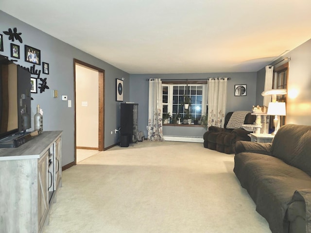 12 Nathaniel Dr, Amherst, NH 03031 - living area with baseboards, a baseboard heating unit, and light colored carpet