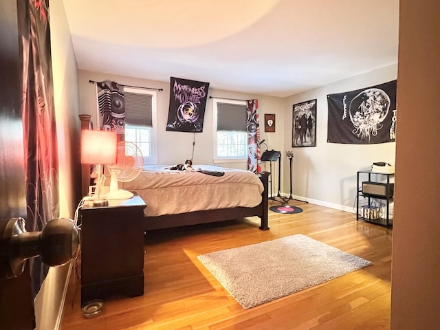 12 Nathaniel Dr, Amherst, NH 03031 - bedroom featuring baseboards and wood finished floors