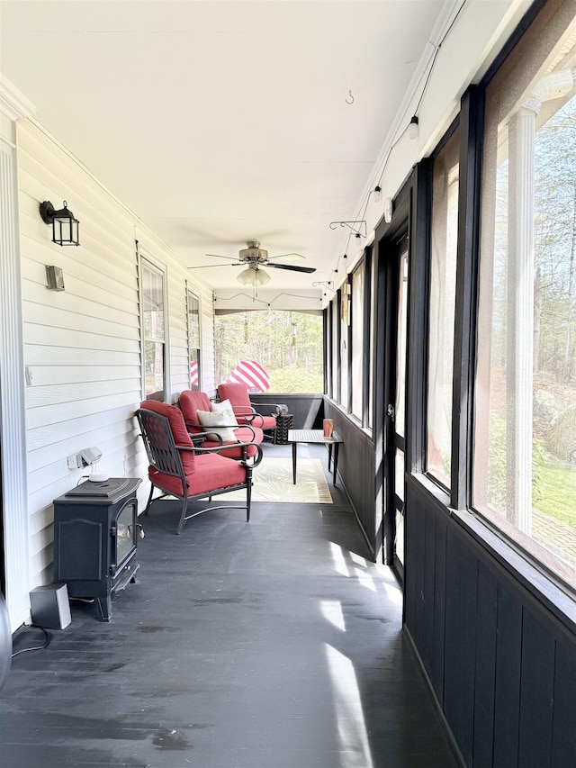 12 Nathaniel Dr, Amherst, NH 03031 - sunroom / solarium featuring a healthy amount of sunlight and a ceiling fan