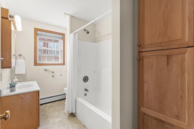 full bathroom featuring toilet, baseboard heating, shower / tub combo, and vanity