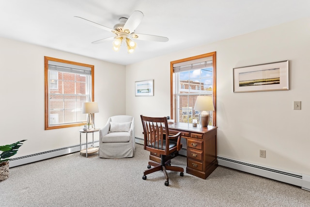 office with a baseboard radiator, carpet, and ceiling fan