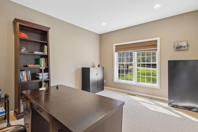 office space with recessed lighting, baseboards, visible vents, and light carpet