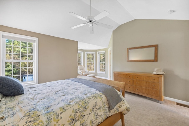 bedroom with a ceiling fan, visible vents, vaulted ceiling, baseboards, and light carpet