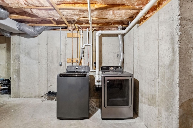 laundry area with washer and dryer and laundry area
