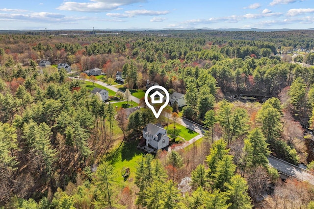 drone / aerial view with a forest view