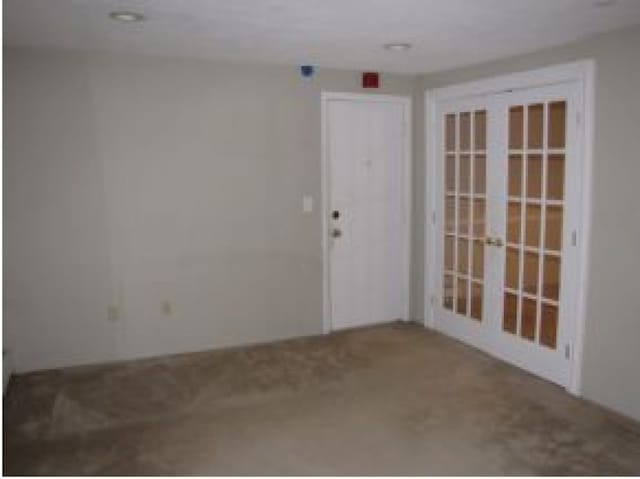 131 English Village Rd Unit 204, Manchester, NH 03102 - unfurnished room with carpet floors and french doors