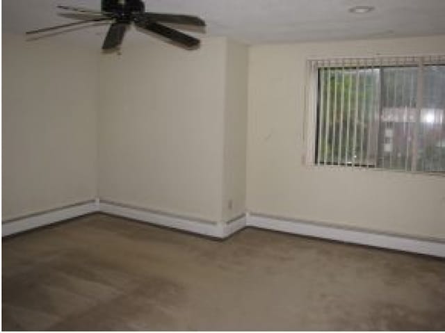 131 English Village Rd Unit 204, Manchester, NH 03102 - unfurnished room featuring a ceiling fan and baseboard heating