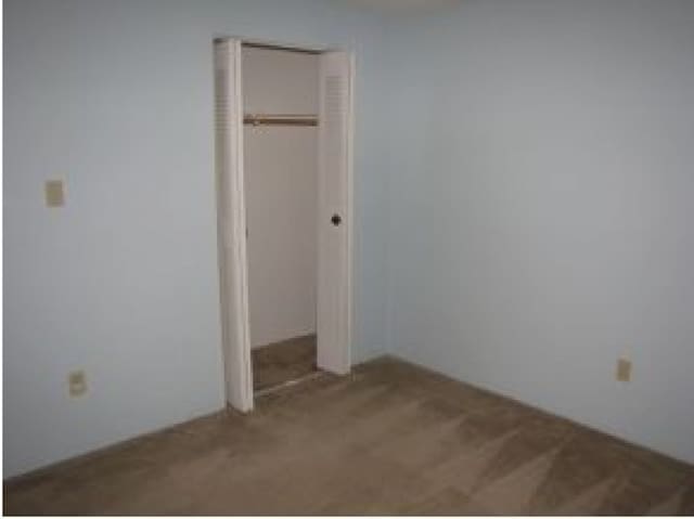 131 English Village Rd Unit 204, Manchester, NH 03102 - unfurnished bedroom with a closet and carpet floors