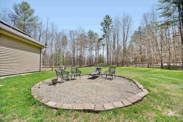 view of yard featuring fence and a patio area