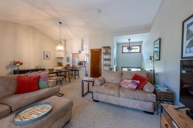 living area featuring light colored carpet and vaulted ceiling