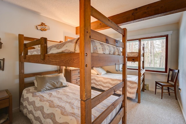 4D Seasons At Attitash Rd Unit D, Bartlett, NH 03812 - carpeted bedroom with baseboards, a textured ceiling, and a baseboard heating unit