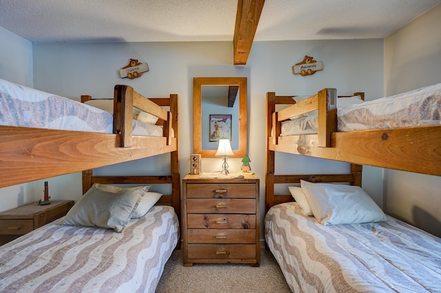 4D Seasons At Attitash Rd Unit D, Bartlett, NH 03812 - bedroom featuring carpet floors and beam ceiling