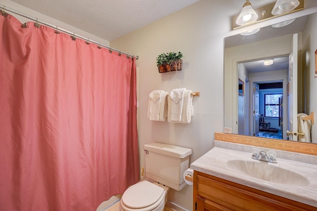 4D Seasons At Attitash Rd Unit D, Bartlett, NH 03812 - full bath featuring vanity, toilet, a shower with curtain, a textured ceiling, and baseboards