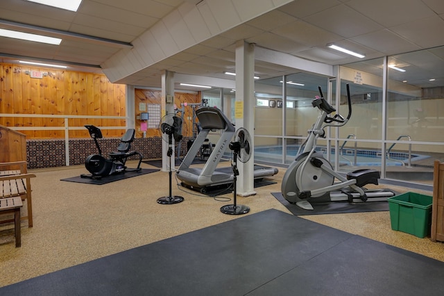 4D Seasons At Attitash Rd Unit D, Bartlett, NH 03812 - workout room with wooden walls, carpet flooring, and a drop ceiling