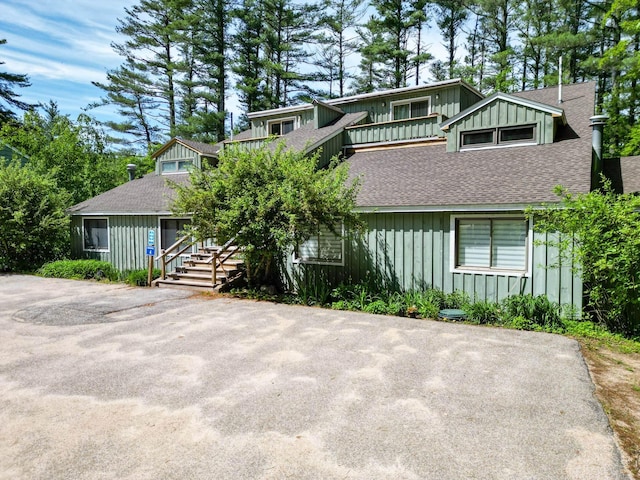 4D Seasons At Attitash Rd Unit D, Bartlett, NH 03812 - view of front of property featuring board and batten siding, roof with shingles, and a balcony