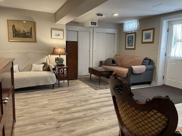 living area featuring light wood-style flooring