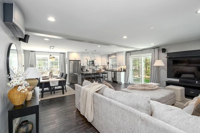 living area with recessed lighting and a wealth of natural light